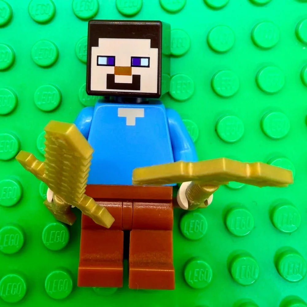 LEGO Minecraft Steve Minifigure with Gold Sword and Pickaxe Accessories